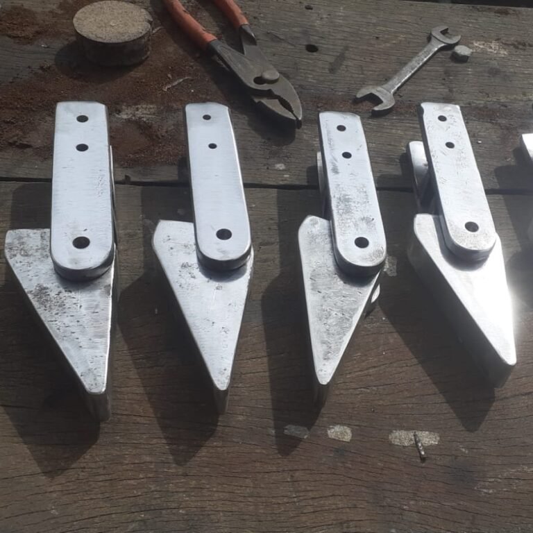 fabricación de dispositivo tipo gatillo para empujar bandejas en línea industrial frigorífica